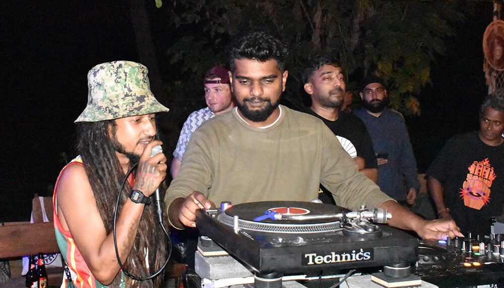 Ras Man Man (left) and Monkey sound system crew