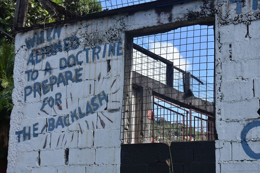 When Aligned to a Doctrine Prepare for a Backlash: 1983 graffiti praising the U.S. Invasion, Photo ©David Katz