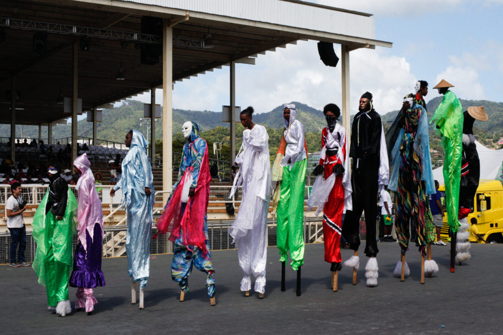 A lineup of Moko Jumbies