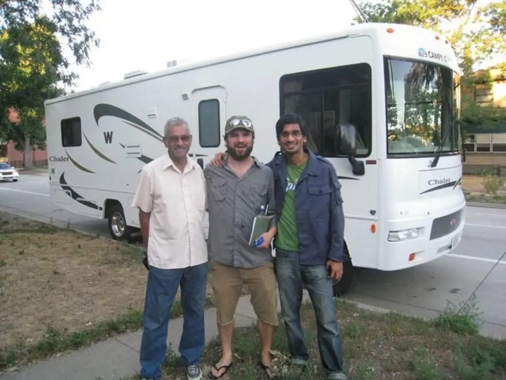 Father Ravindran Nayar, with Johan and Giovanni Ciotti, an old bandmate, roadtripping through America from Denver to Frisco in an RV